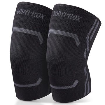 Pair of black knee sleeves with 'BODYPROX' branding on a white background